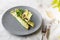 Savory Homemade Mushroom and Spinach green Crepes with Cheese isolated on white marble background. Homemade food. Tasty breakfast