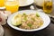 Savory oatmeal porridge with olive oil and avocado