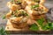 Savory puff cups with ham, mushroom and   vegetables