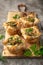 Savory puff muffins with ham, mushroom and   vegetables