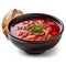 Savory Russian Borscht Soup in a Bowl on White Background .