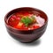 Savory Russian Borscht Soup in a Bowl on White Background .