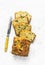 Savory spinach, feta and squash loaf on a light background