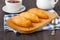 Savory stuffed patties on an wooden table. Country house style