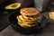 Savory vegetable pancakes in iron skillet