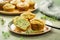 Savory zucchini muffins with herbs, feta cheese and bacon