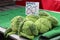 Savoy cabbages for sale on a market stall