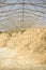 Sawdust or organic fuel for greenhouse. Wood shavings mount.