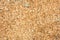 Sawdust or wood dust texture background. Wood sawdust background closeup. Sawdust floor texture. Top view. Saw dust texture, close