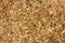 Sawdust or wood dust texture background. Wood sawdust background closeup. Sawdust floor texture. Top view. Saw dust texture, close