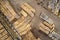 Sawmill logs stacked aerial view and wood saw machinery