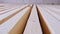 Sawn boards lie on the floor parallel to each other for drying. Preparation for the installation of an eco-friendly wooden floor i