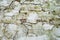 Sawn cross wall texture pattern of stone textured tile. Stone rock tile background