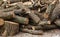 sawn-off trunk of old acacia prepared for heating in the house