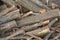 Sawn trees and folded in a pile. Piled logs. Texture, background.