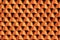 Sawtooth pattern brickwork. Decorative red brick wall as background