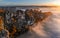 Saxon, Germany - Aerial panoramic view of the Bastei on a foggy autumn morning with colorful autumn foliage and heavy fog