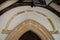 Saxon round arched nave doorway, Church of St Andrew, Miserden