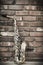 Saxophone Brick Wall