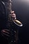 Saxophone player jazz saxophonist hands close up