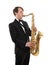 Saxophonist in a tuxedo plays music on sax.