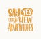 Say Yes To New Adventures inspirational phrase handwritten with elegant cursive calligraphic font or script. Creative