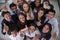 We say yes to success. High angle portrait of a group of coworkers showing a thumbs up in the office.