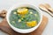 Sayur bening bayam or Spinach Soup is Indonesian food made from spinach and corn.