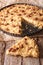 Sbrisolona Italian pie slice close-up. vertical