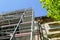 Scaffolding assembled at a historic house before facade repairs