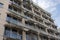 scaffolding being used to repair broken window on high-rise building