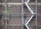 Scaffolding ladder against brick wall