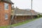 Scaffolding and roof repairs on a house in UK