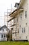 Scaffolding on the Side of a Home Having Repairs