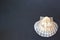 Scallop shell on a slate plate