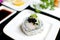 Scallop sushi roll on plate