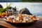 scallops in a seashell serving dish beside beach bbq