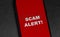 Scam Alert concept on screen mobile