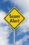 Scam Alert yellow warning highway road sign