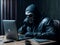 A scammer in a mask sits in front of a laptop.