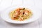 Scampi with butter white wine sauce and spaghetti