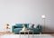 Scandinavian bright living room design, blue sofa with natural wooden furniture