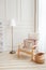 Scandinavian interior of a living room. Armchair and floor lamp