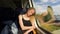 Scandinavian look model sleeps in the train. Beautiful woman dreams while sleeping after work. Sunny evening trip.