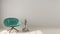 Scandinavian minimalistic background, with turquoise armchair on