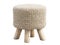 Scandinavian pouf with a knitted seat and wooden legs. 3d render