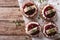 Scandinavian sandwich with herring, beetroot and cream cheese. h