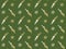 Scandinavian seamless pattern of yellow-white rabbits and flowers on a green background. Easter texture.