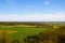 A Scanian Southern Sweden landscape filled with fields of green, gold and yellow taken in Billebjer, Lunds kommun, Sweden