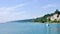 Scarborough Bluffs with boat on Lake Ontario on a sunny day - Toronto